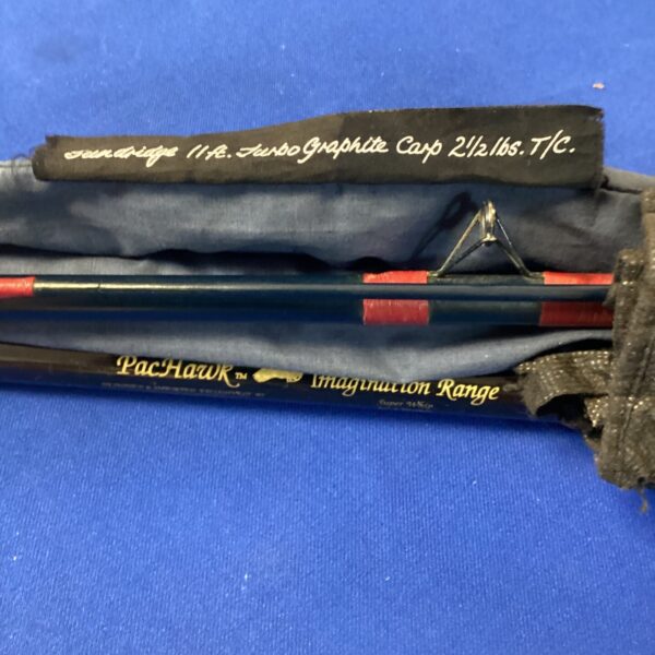 Close-up of a bundle of course fishing rods, including Sundridge and PacHawk.