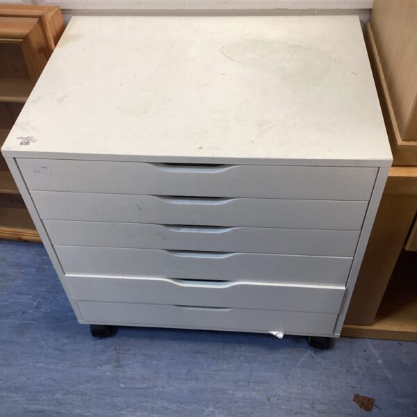 White six-drawer unit on wheels for office or home storage.