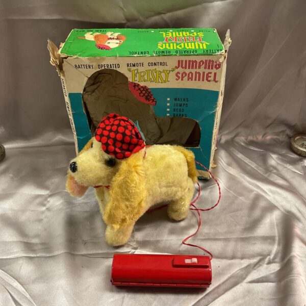 Vintage Frisky Jumping Spaniel toy with original box.
