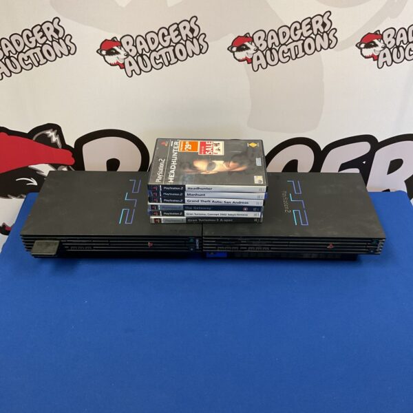 PlayStation 2 console lot with six games stacked on top.