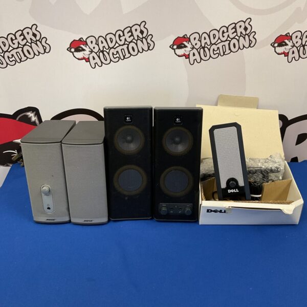 Mixed lot of PC speakers including Bose, Logitech, and Dell brands.
