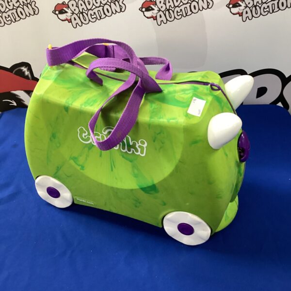 Green Trunki ride-on suitcase for children's travel.