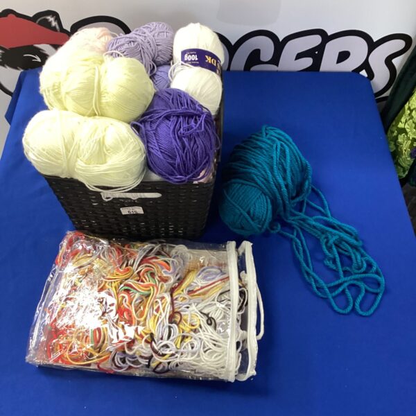 Colourful embroidery and knitting wool lot for crafting projects.
