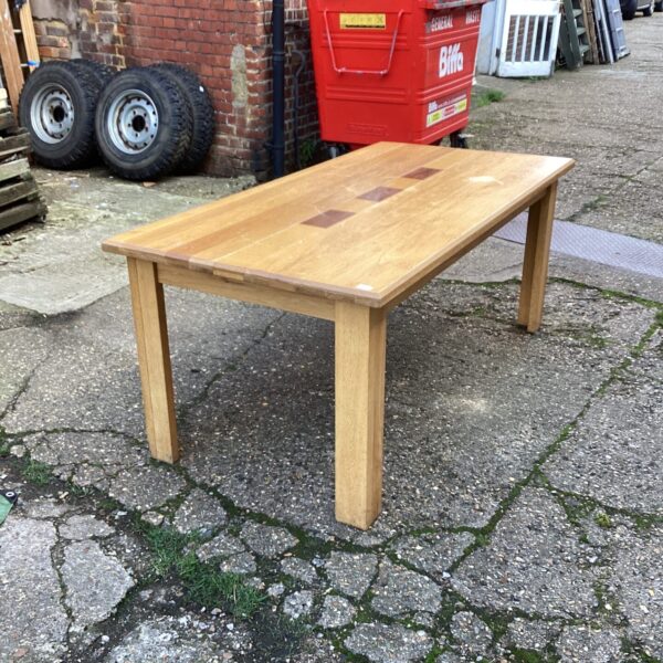 Large solid oak dining table with rustic character.