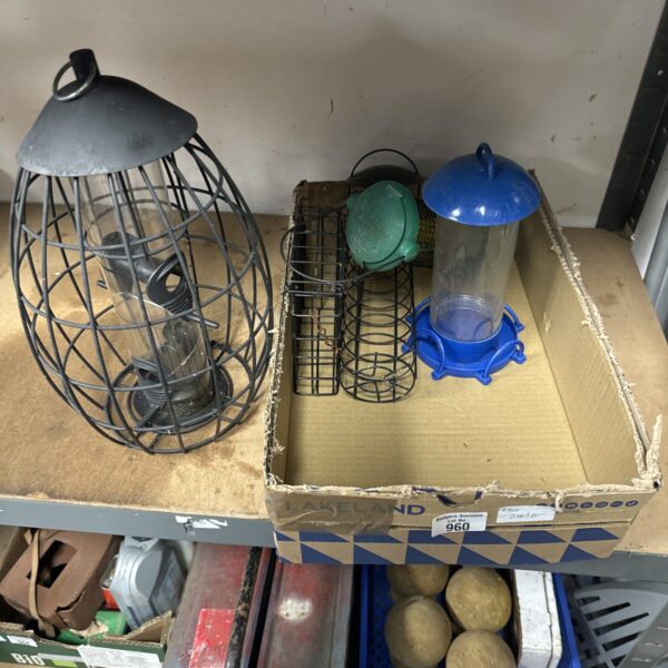 Selection of used garden bird feeders for wild birds.