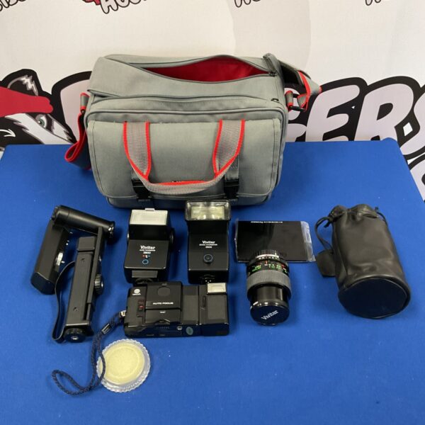 Vintage Minolta AF-C 35mm film camera with carry bag.