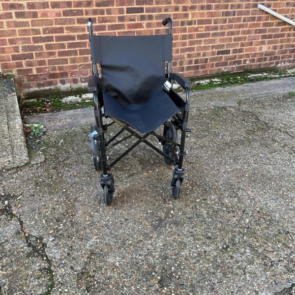 Black Rhealthcare folding wheelchair for mobility assistance.
