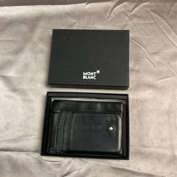 Front view of a black Montblanc leather wallet.