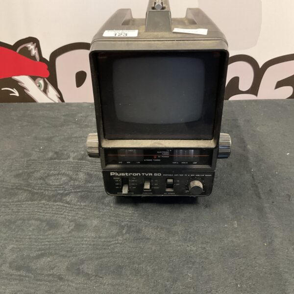 Vintage Plustron TVR50 portable television with tuning dial.