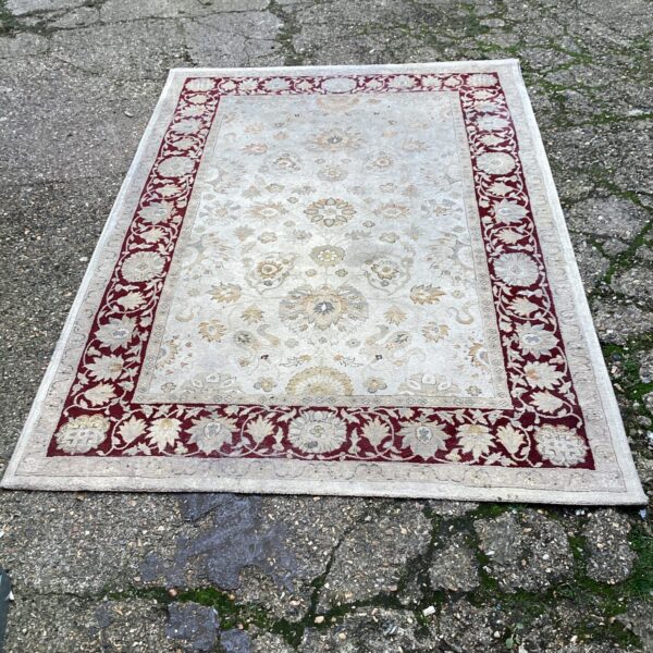 Large floral rug with Persian style pattern for home decor.
