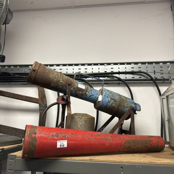 Vintage propane crow scarer for bird control on a farm.