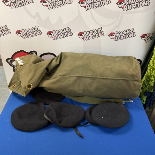 Job lot of vintage military berets in varying colours.