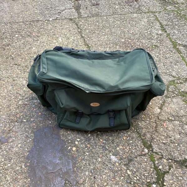 Green Cypry holdall angling bag with multiple compartments.