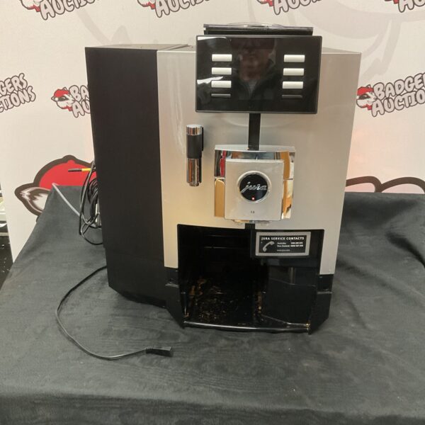 Silver Jura Impressa coffee machine for spares or repair.
