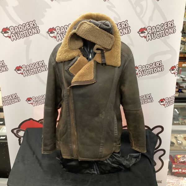 Vintage leather flying jacket with fleece lining and helmet.
