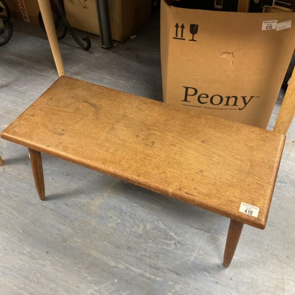 Vintage mid-century modern magazine table with tapered legs.