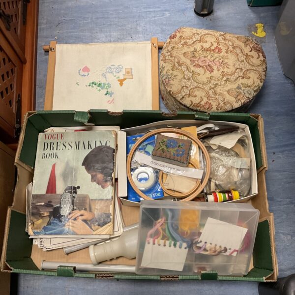 Vintage sewing lot with Vogue dressmaking book and patterns.