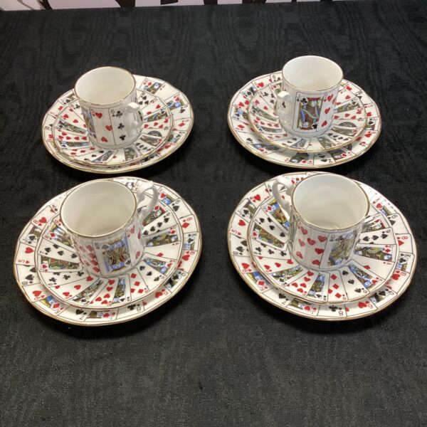 Antique Elizabethan playing card mug and saucer set.