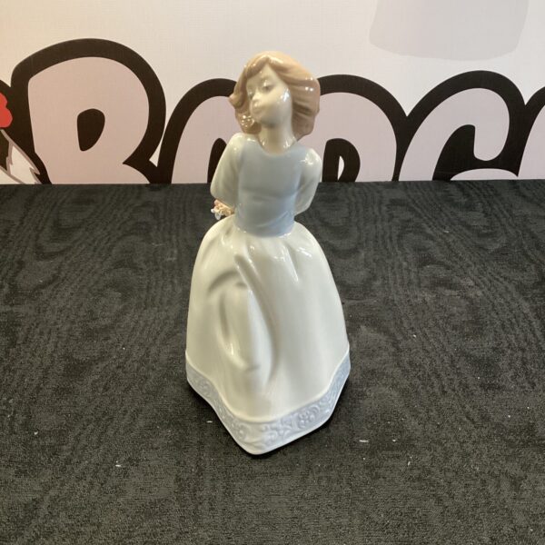 Nadal porcelain figurine of girl