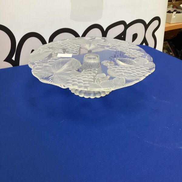 Vintage cut glass cake stand with intricate pressed glass design.