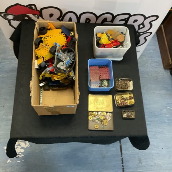 Vintage Meccano parts lot with metal plates and fixings.