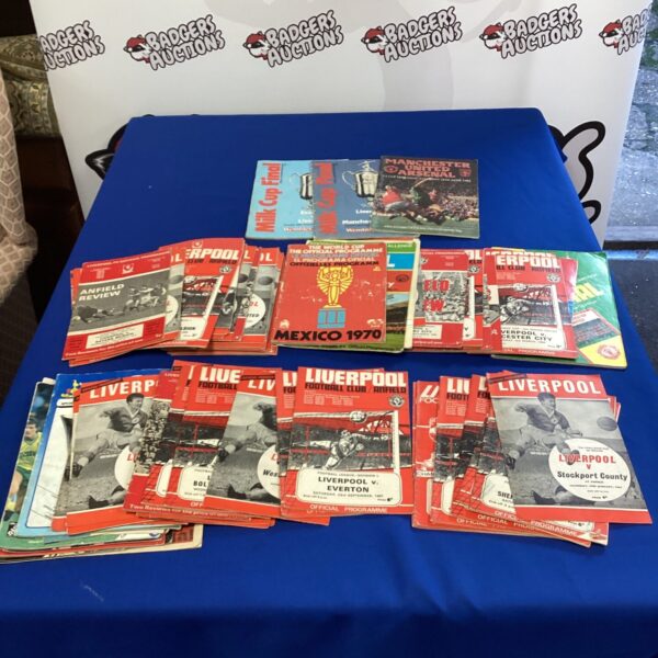 Vintage Liverpool football programmes including Wembley Milk Cup Final edition.