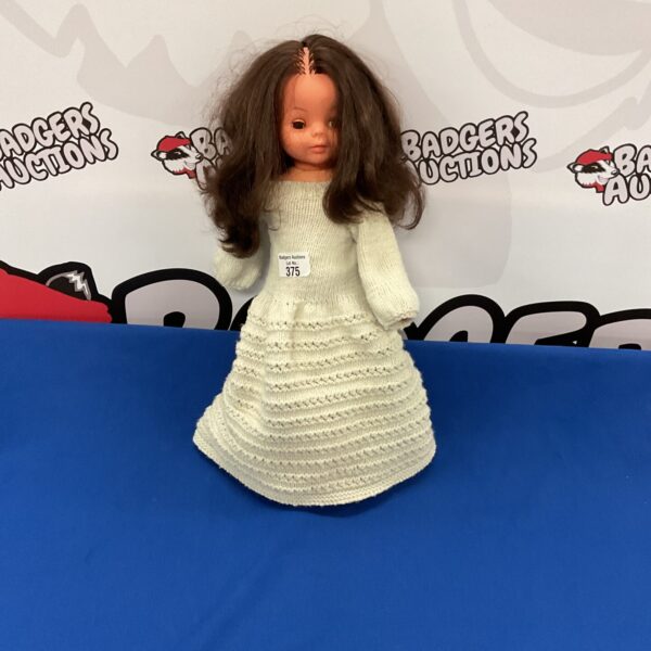 Vintage Ozen Cinderella doll with long hair.