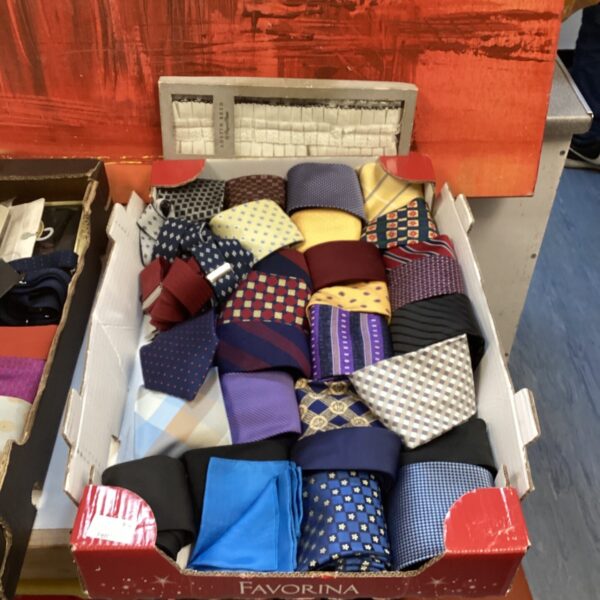 Vintage collection of silk ties and braces for men's fashion.