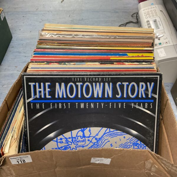 Vintage vinyl record lot including Motown and Jim Reeves albums.