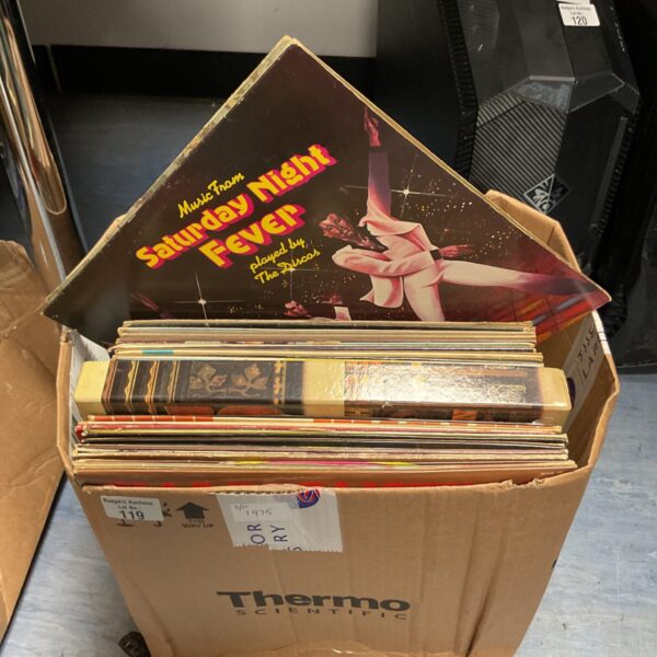 Vinyl record lot featuring Saturday Night Fever and Johnny Cash albums.