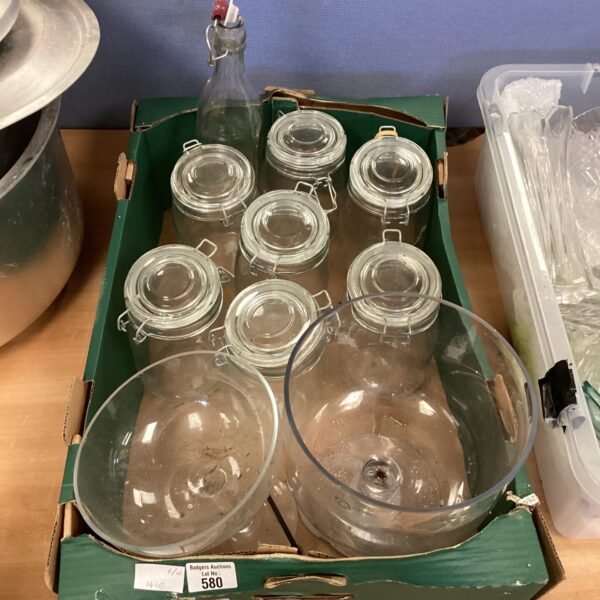 Vintage Kilner jar collection with serving bowls on display.