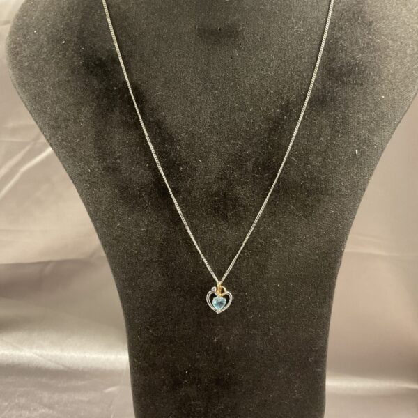 H Samuel silver necklace with 9ct gold charm pendant.