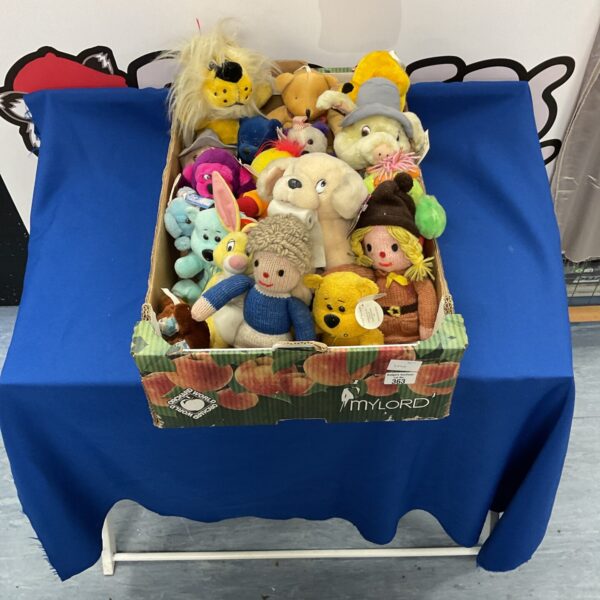 Mixed lot of vintage and modern teddy bears and stuffed animals.