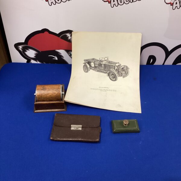 Vintage stamp roller with Bentley image, collectible desk accessory.