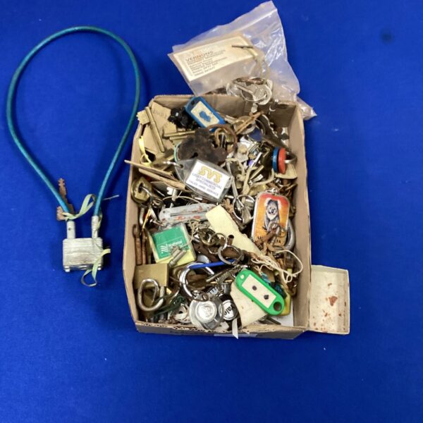 Large lot of vintage keys and padlocks for collectors.