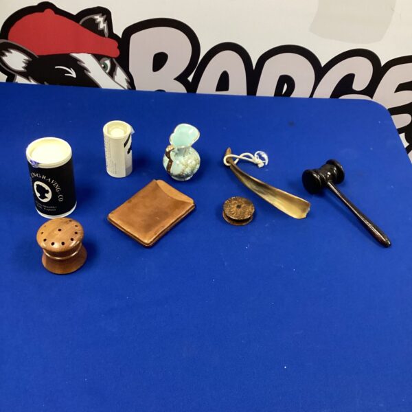 Mixed lot of vintage collectibles featuring a wooden gavel.