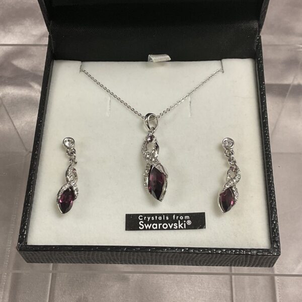 Sparkling Swarovski crystal necklace and earrings set by Warren James.