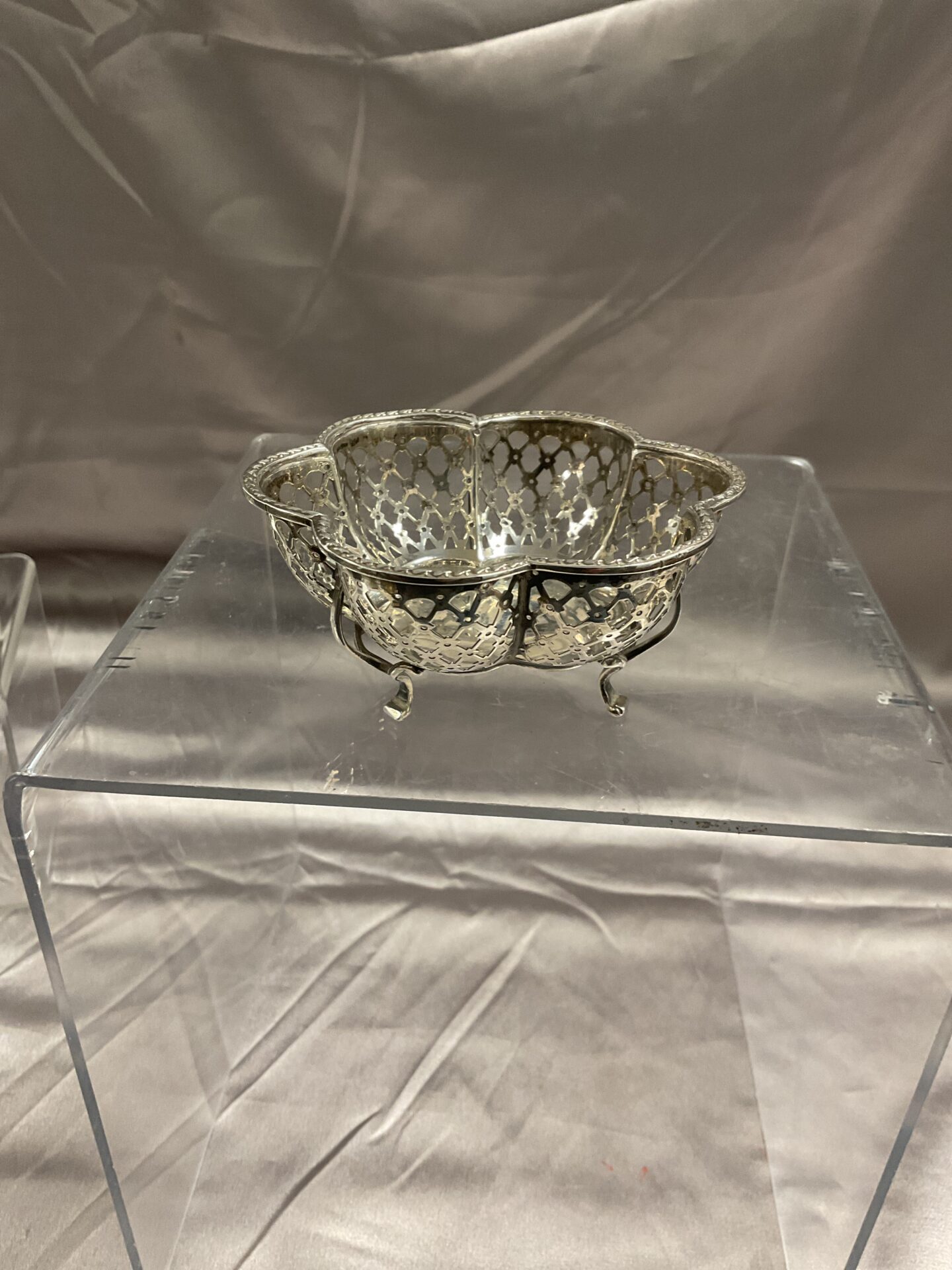 876 Hallmarked silver 4” three footed pierced bonbon dish 55.32g hallmarks worn