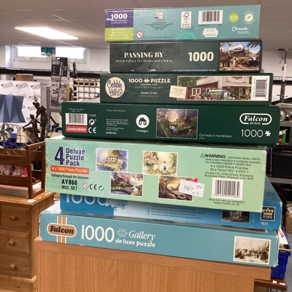 Falcon De Luxe jigsaw puzzles featuring charming cottage scenes, 1000 pieces.