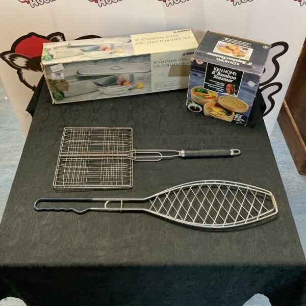 Stainless steel fish poacher set with bamboo steamer and grillers.