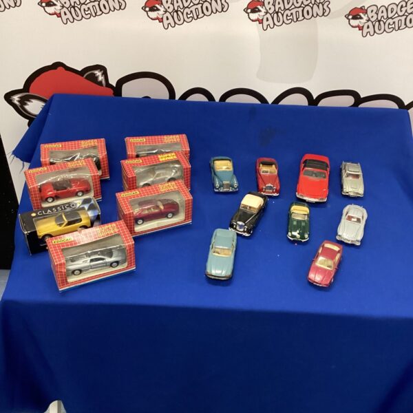 Vintage diecast model cars including Corgi, collectible toy cars.