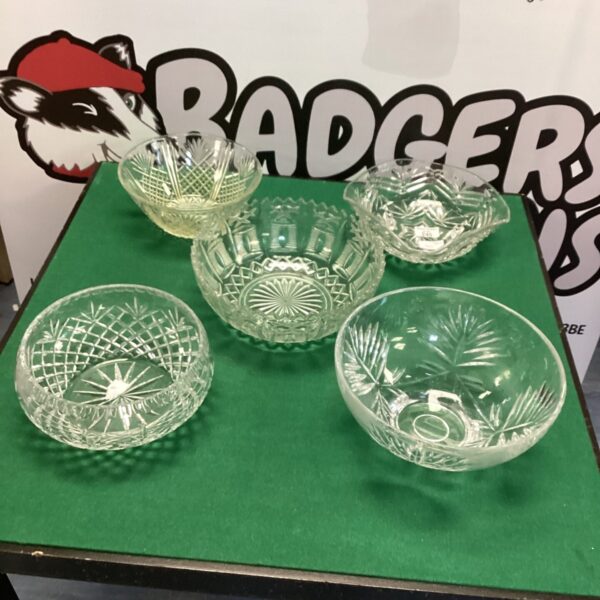 Vintage glass fruit bowl with intricate pressed glass design.