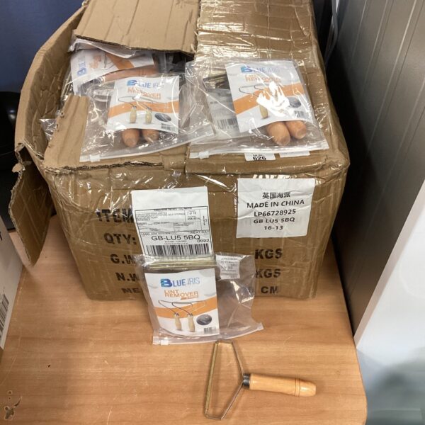 Large lot of new Blue Iris lint removers in sealed bags.
