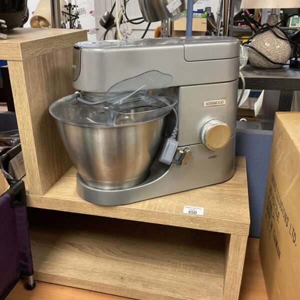 White vintage Kenwood food mixer with stainless steel bowl.