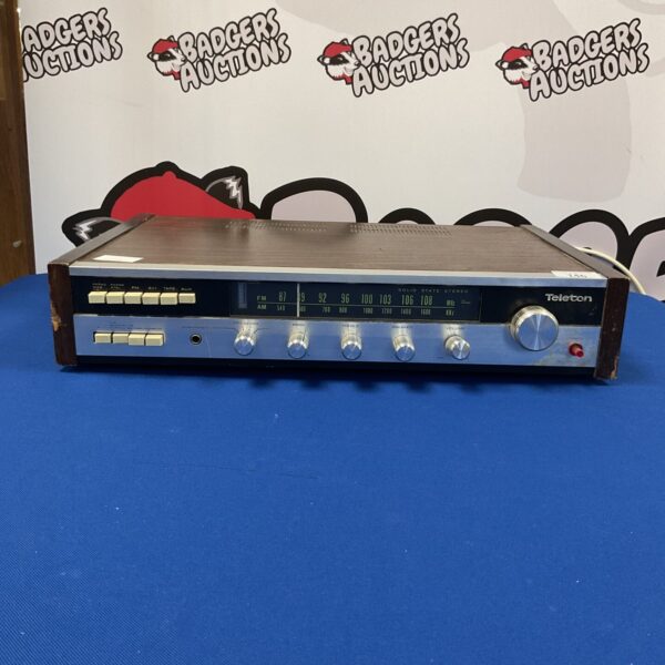Front view of a vintage Teleton amplifier and radio tuner.