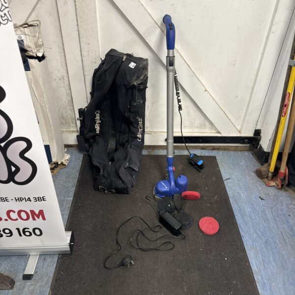 Caddyclean golf cart cleaner with power unit and brush head.