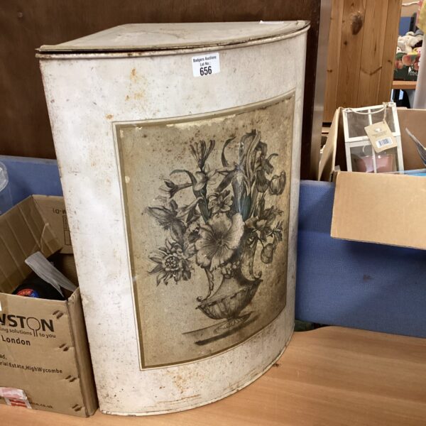 Vintage laundry box with a floral print, shabby chic style.