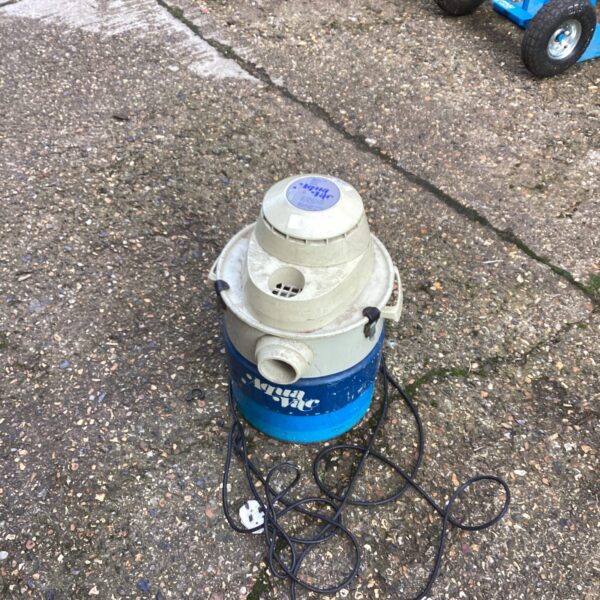 Vintage Aqua Vac pool cleaner for automatic pool maintenance.