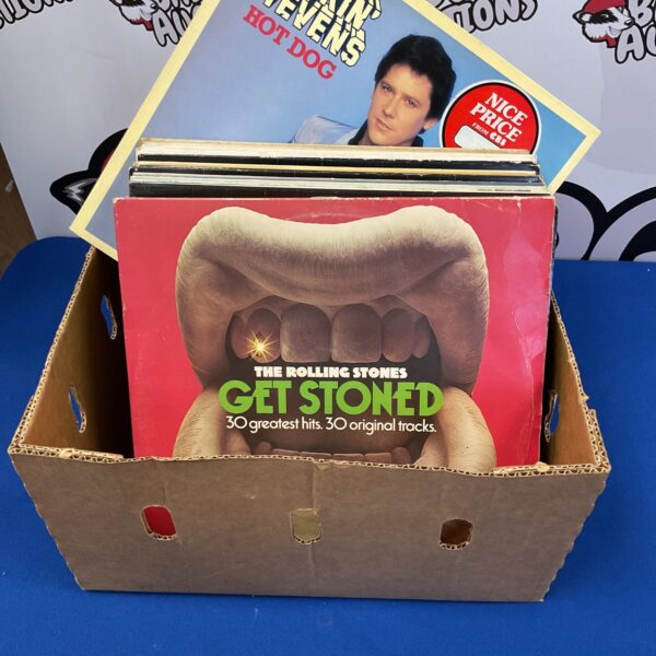 Vinyl record lot featuring Rolling Stones and Shakin Stevens albums.