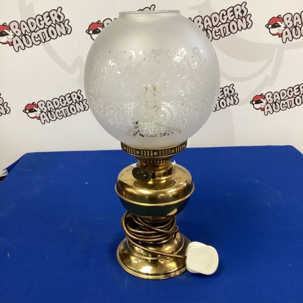 Vintage brass table lamp with frosted glass shade.
